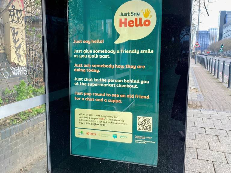 A bus stop poster for the Just Say Hello campaign