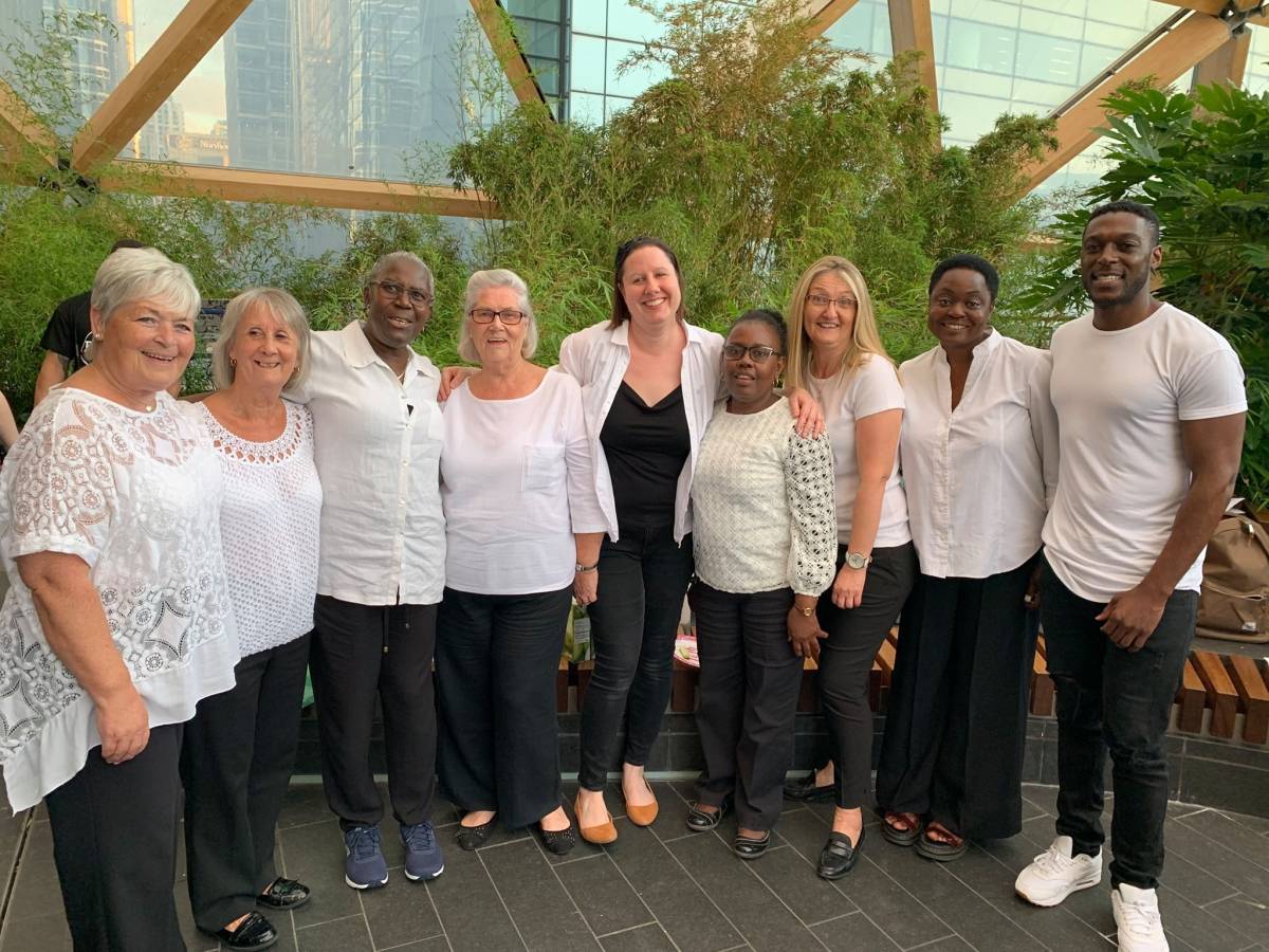 Performers from the Isle of Dogs Voices singing group