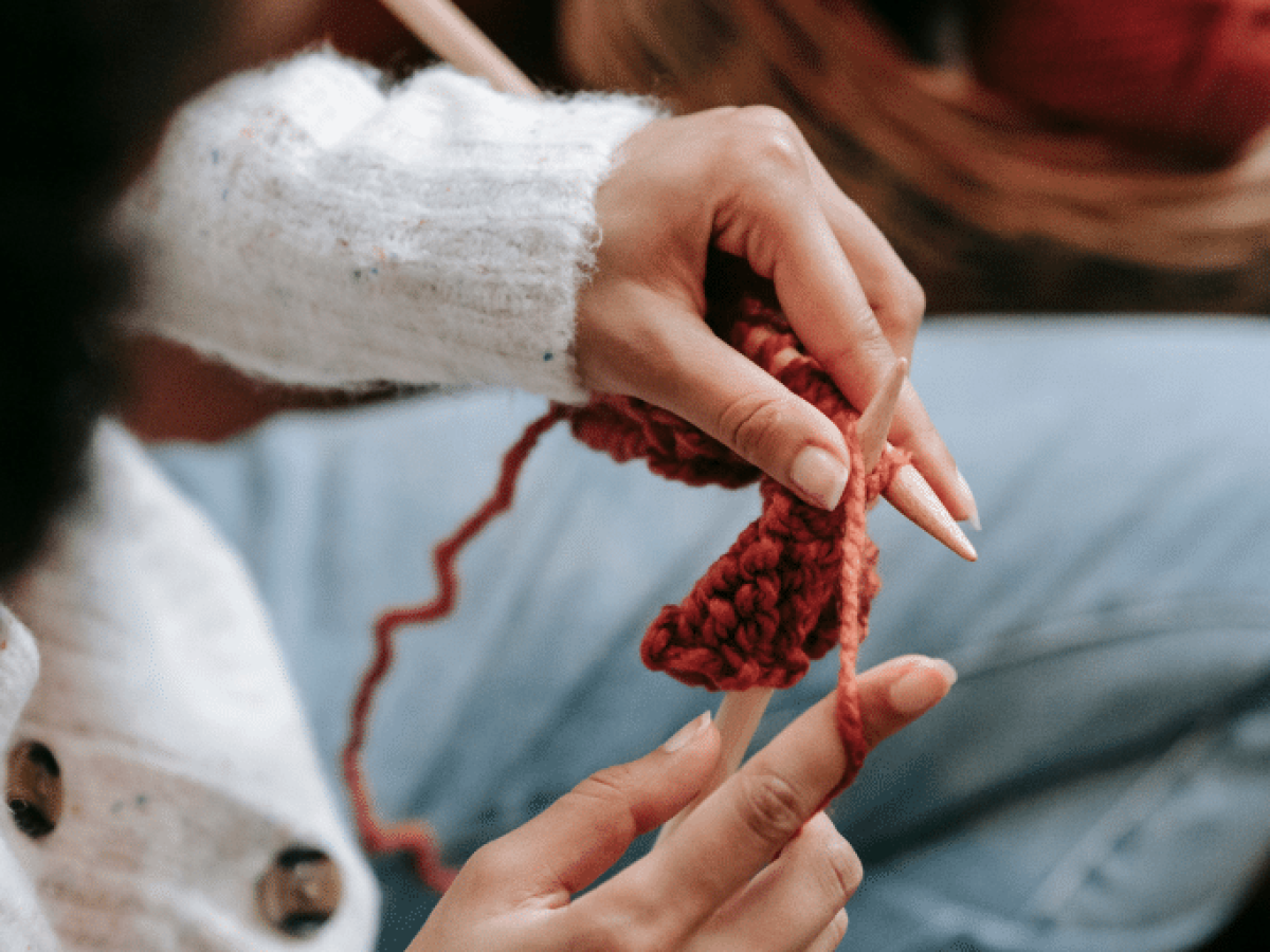 Close up of hands knitting