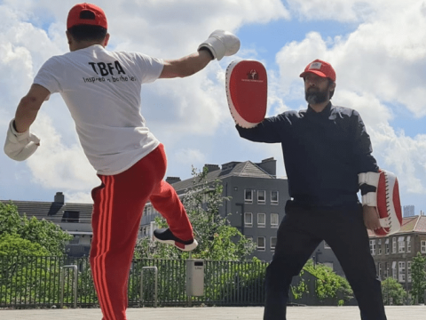 Instructors from Thai Boxing Fighters Academy demonstrate some Muay Thai kicks.