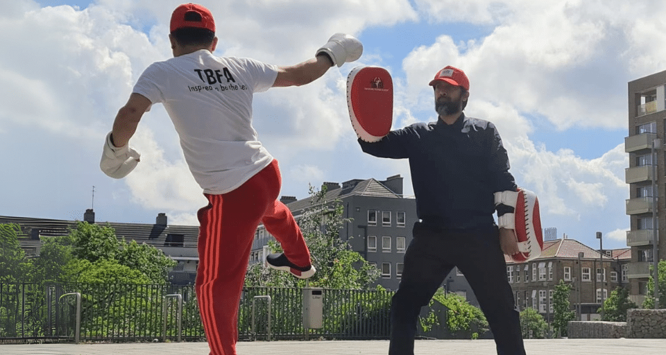 Instructors from Thai Boxing Fighters Academy demonstrate some Muay Thai kicks.